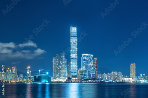 Panorama of skyline of Victoria harbor of Hong Kong city at night