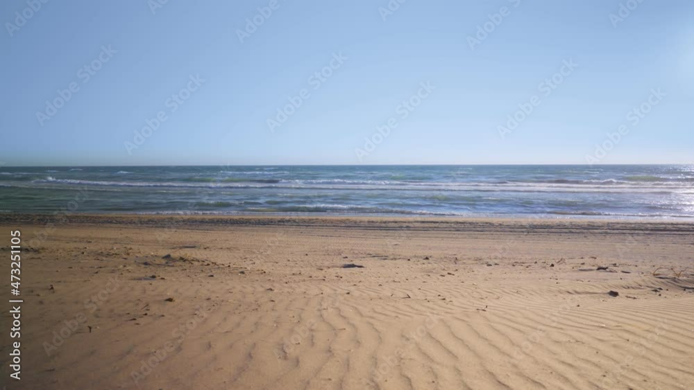 Empty beach with clear blues skies Empty beach with clear blues skies