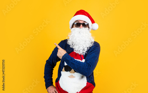 All I want for Christmas. new year party. celebrate winter holidays. merry christmas to you. xmas shopping time. prepare gifts and presents. just have fun. happy bearded mature man in santa claus hat