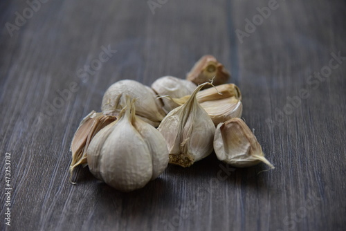 Allium sativum, Garlic is a species of bulbous flowering plant in the genus Allium and used as culinary receips.