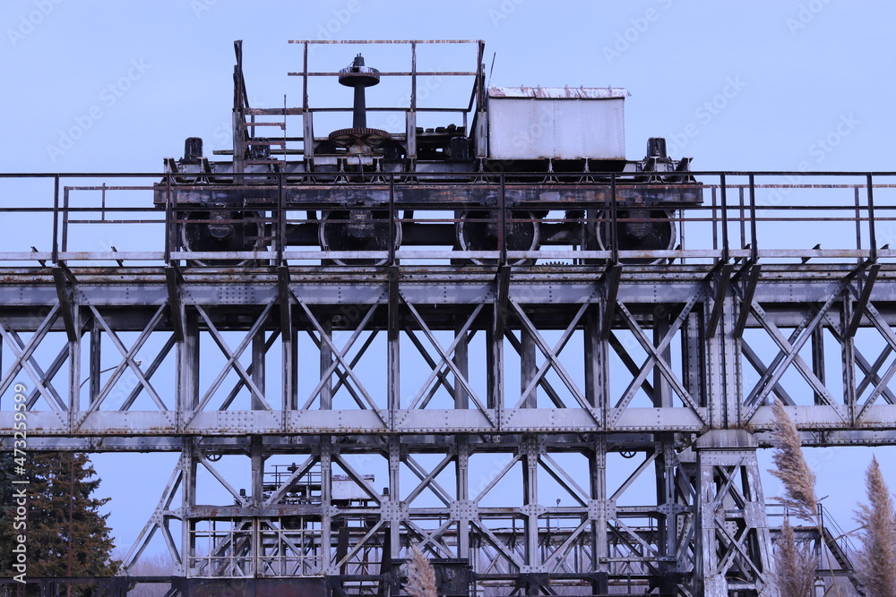 Naklejka premium a locomotive on the dam with the help of which they open the gate