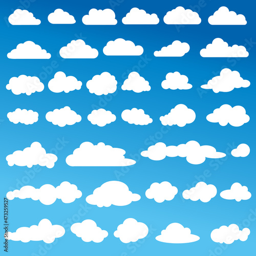Fototapeta Naklejka Na Ścianę i Meble -  The set of white clouds on a blue gradient sky.   A set of white clouds on a blue gradient sky. simple vector graphics. Large set