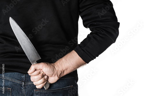 Photo Person hairy skin chef holding kitchen knife hidden behind the back