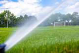 irrigation with the help of pressure jets with water at the football stadium