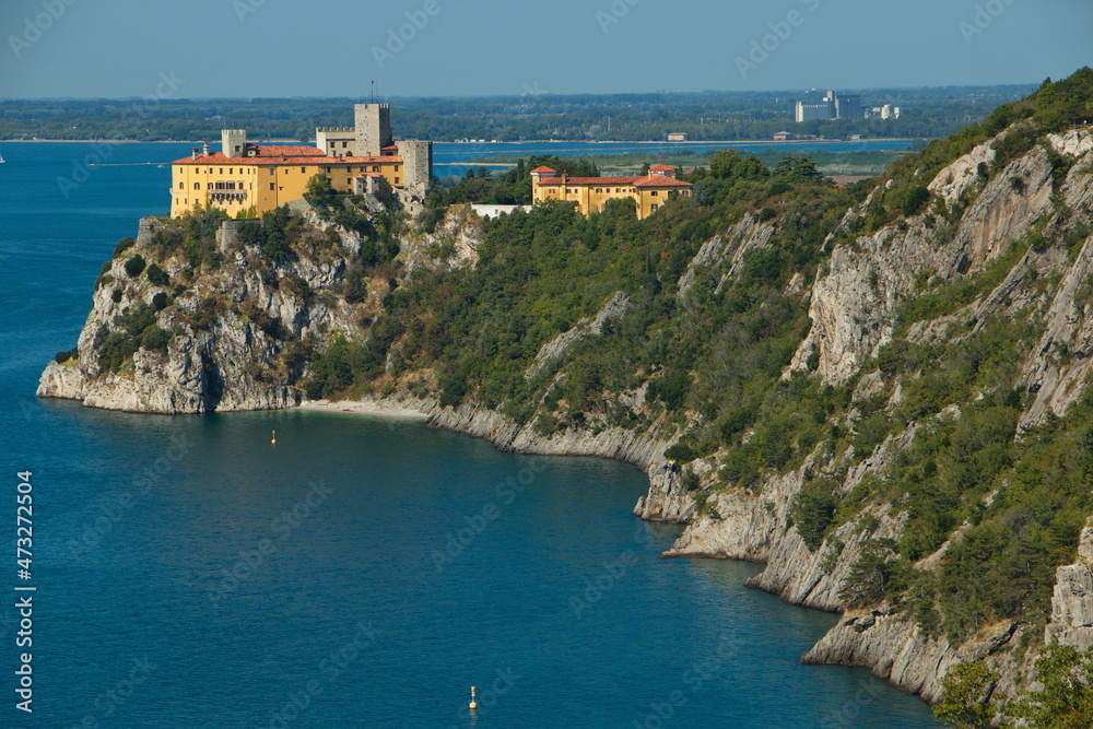 View of castle Duino from the hiking trail from Sistiana, Italy, Europe
