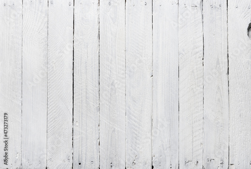 Rustic white wooden texture top view. Bright white painted vintage wood background.