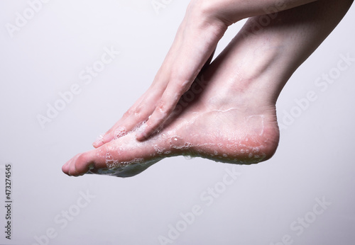 Washing your feet. Foam feet. Wash your feet with soap