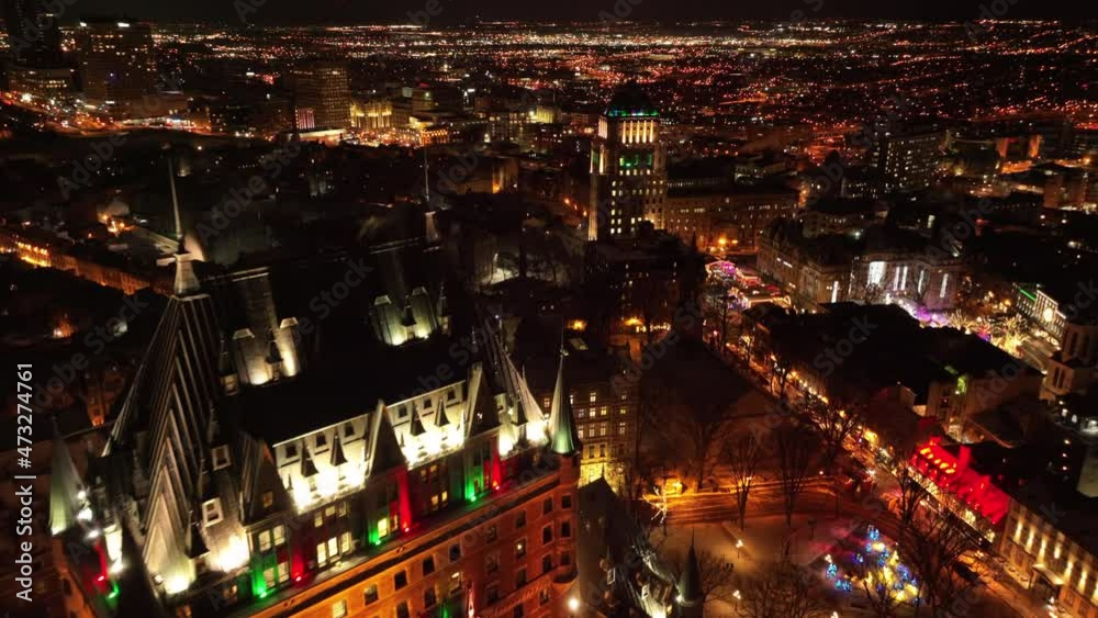 Panoramic View On Old Quebec Illuminated At Night In Quebec City, Canada - aerial drone shot Panoramic View On Old Quebec Illuminated At Night In Quebec City, Canada - aerial drone shot