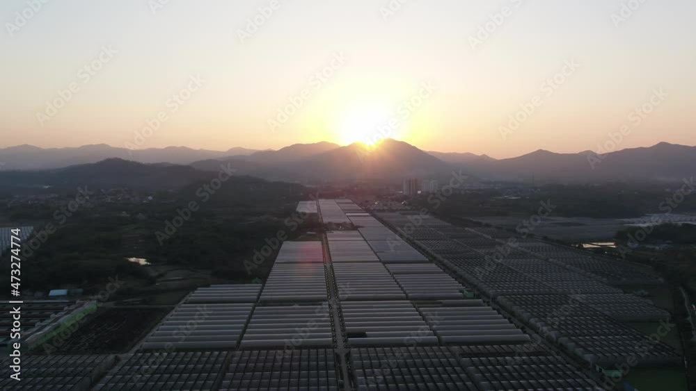 Vegetable shed with mountain village during sunset Vegetable shed with mountain village during sunset