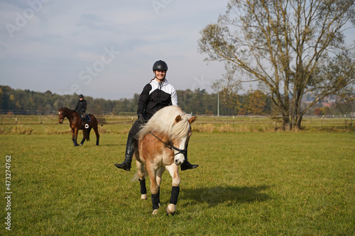 Shooting with horses and riders in autumn photo