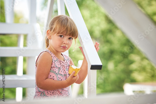 Free Download Cute little girl eating ice cream - GFXLoad