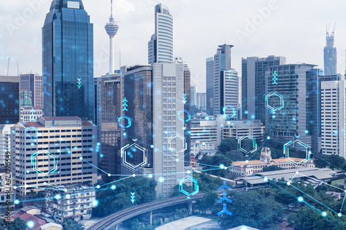 Photography Technology hologram over panorama city view of Kuala Lumpur