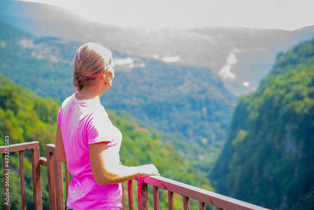 girl on the observation deck of okatse canyon