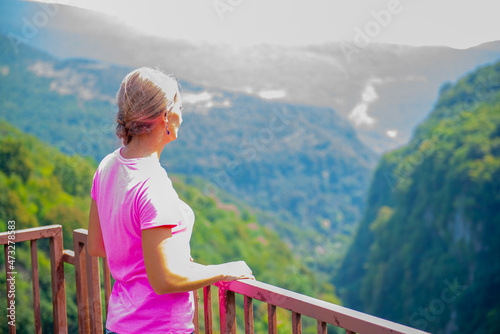 girl on the observation deck of okatse canyon