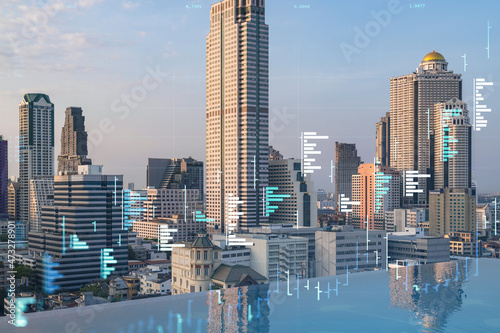 Glowing FOREX graph hologram, aerial panoramic cityscape of Bangkok at sunset. Stock and bond trading in Southeast Asia. The concept of fund management. Double exposure.