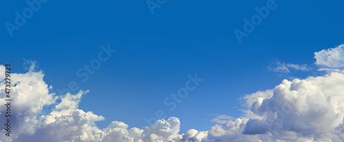 Photography Blue sky with cumulus fluffy clouds.