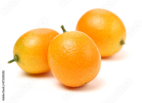 kumquat on a white background