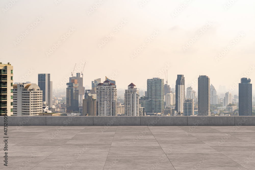 Fototapeta premium Panoramic Bangkok skyline view, concrete observatory deck on rooftop, daytime. Luxury Asian corporate and residential lifestyle. Financial city downtown, real estate. Product display mockup empty roof