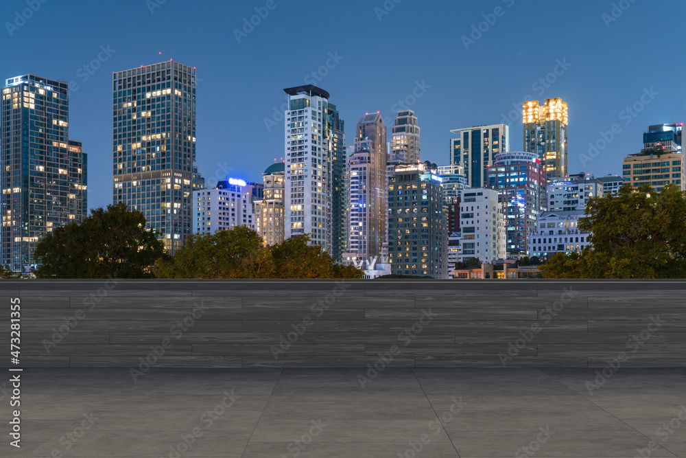 Panoramic Bangkok skyline view, concrete observatory deck on rooftop, night time. Asian corporate and residential lifestyle. Financial city downtown, real estate. Product display mockup empty roof Panoramic Bangkok skyline view, concrete observatory deck on rooftop, night time. Asian corporate and residential lifestyle. Financial city downtown, real estate. Product display mockup empty roof