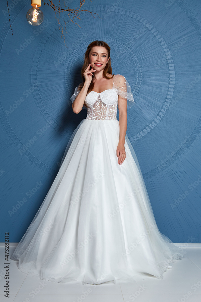 Sexy beautiful brunette woman pretty bride wedding big day marriage ceremony in summer garden wearing long silk and lace white dress bright makeup hairstyle pure love interior. Sexy beautiful brunette woman pretty bride wedding big day marriage ceremony in summer garden wearing long silk and lace white dress bright makeup hairstyle pure love interior.