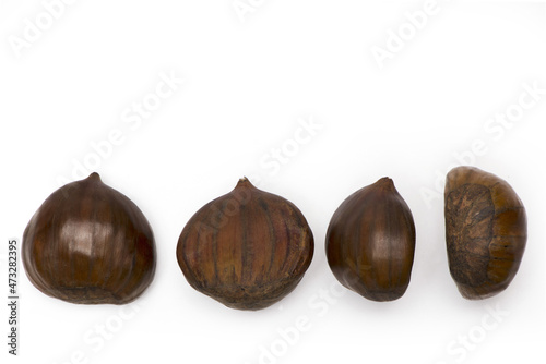 four chestnuts from different sides white background