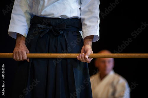 Black belt aikido master during a training session.