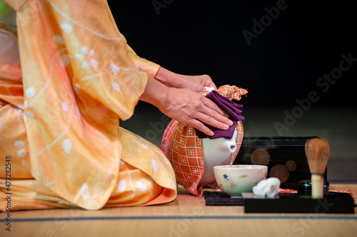 Japanese woman in traditional kimono, during the tea ceremony, at Japanese Festival 2021..