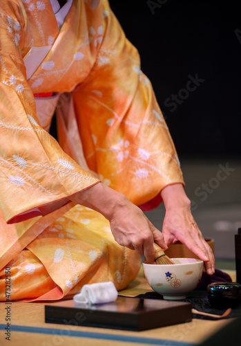 Japanese woman in traditional kimono, during the tea ceremony, at Japanese Festival 2021..
