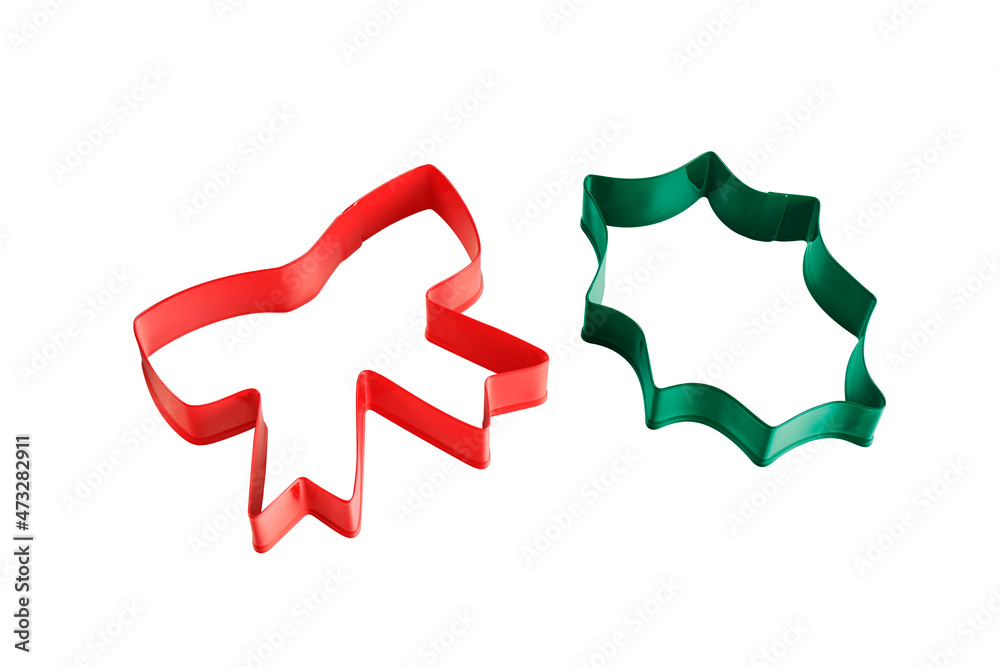 Set of metal painted holly leaf and bow shaped cookie cutters Set of metal painted holly leaf and bow shaped cookie cutters