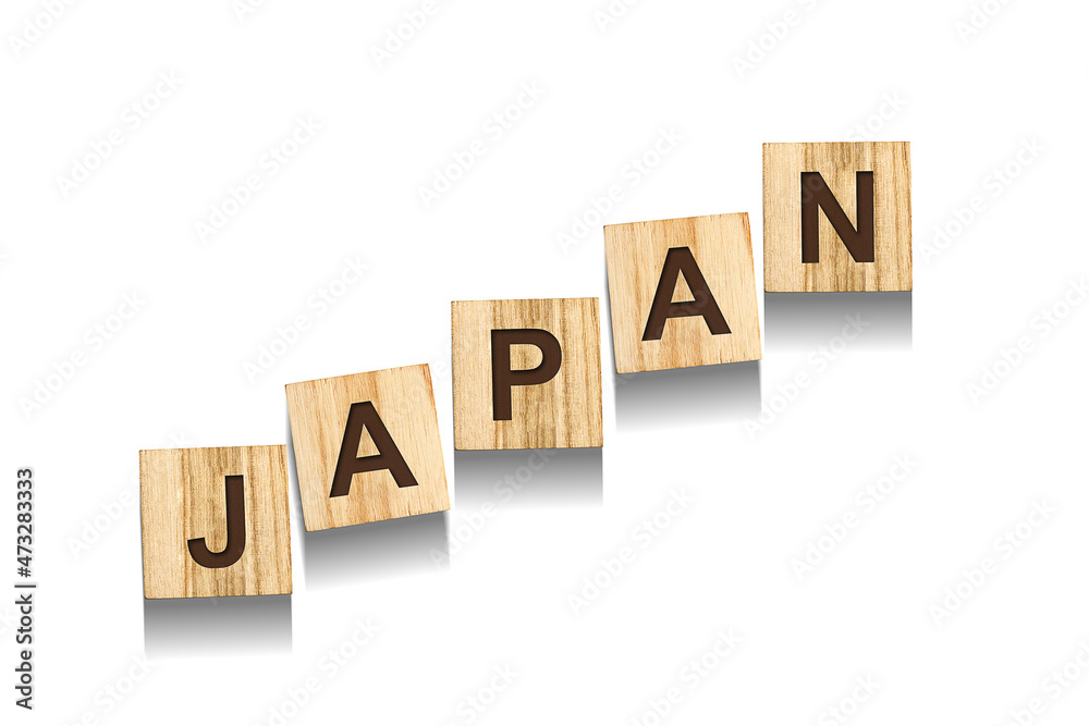 Japan, word on wooden blocks. Isolated on a white background. Japan, word on wooden blocks. Isolated on a white background.