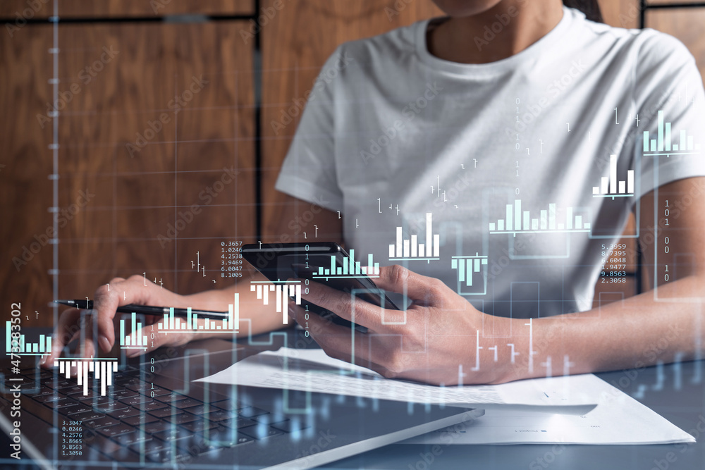Fototapeta premium Woman hands typing the keyboard to research stock market to proceed right investment solutions. Internet trading and wealth management concept. Casual wear. Hologram Forex chart over close up shot