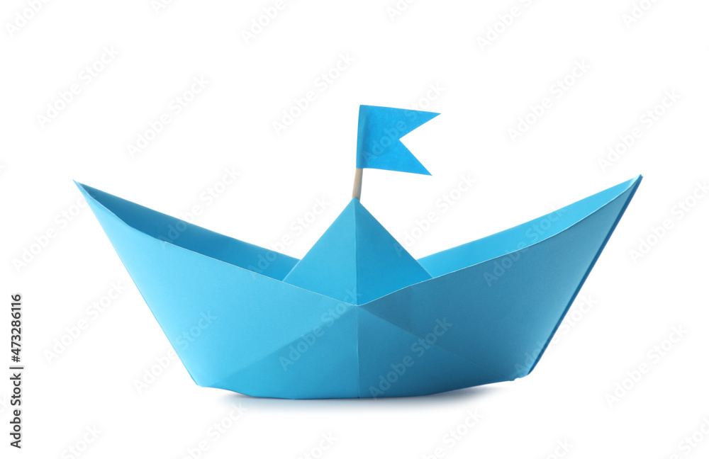 Handmade light blue paper boat with flag isolated on white. Origami art Handmade light blue paper boat with flag isolated on white. Origami art