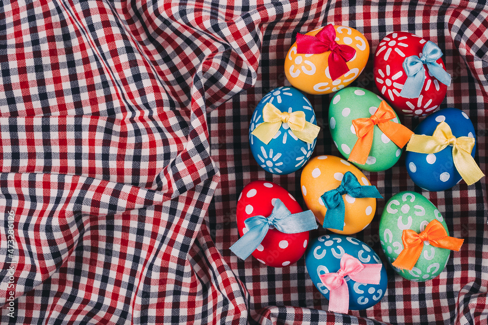 Perfect colorful handmade easter eggs on a fabric background