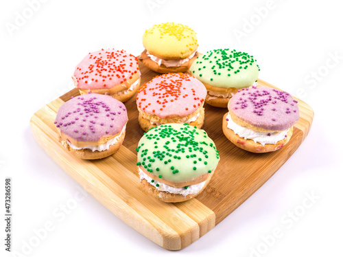 colorful handmade cakes on a white background