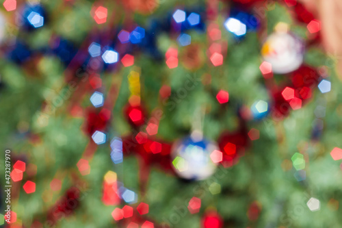 Background of blurred Christmas lights on Christmas tree