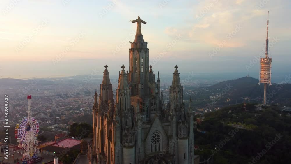 Tibidabo mountain with the temple of the Sacred Heart. Top view on Barcelona, Spain, UHD, 4K Tibidabo mountain with the temple of the Sacred Heart. Top view on Barcelona, Spain, UHD, 4K