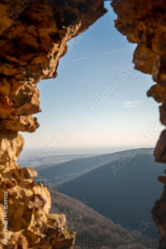 Ruins of an old fortress in Vrdnik, Vojvodina, Serbia. Ancient stone walls with mountain view © olezzo