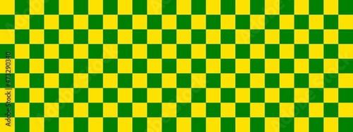 Checkerboard banner. Green and Yellow colors of checkerboard. Small squares, small cells. Chessboard, checkerboard texture. Squares pattern. Background.
