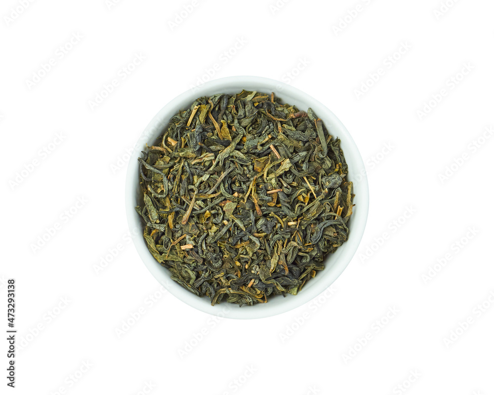 Fototapeta premium Dry green tea in white bowl isolated on white background. Healthy drink.