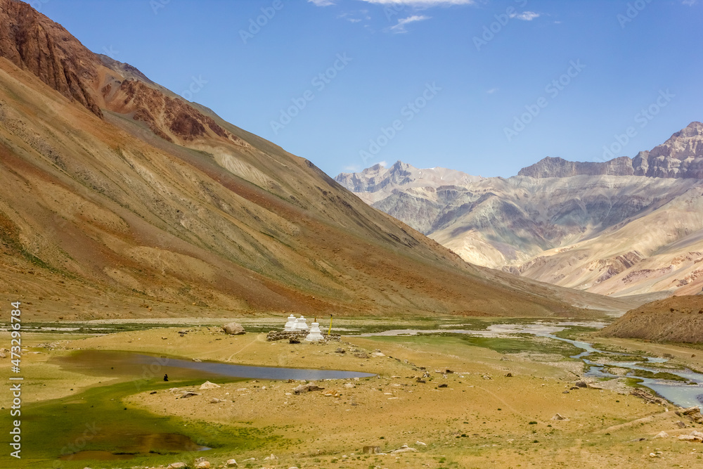 Beautiful landscape of the barren mountains of the Zanskar range on a wilderness trek from Darcha to Padum in Ladakh.