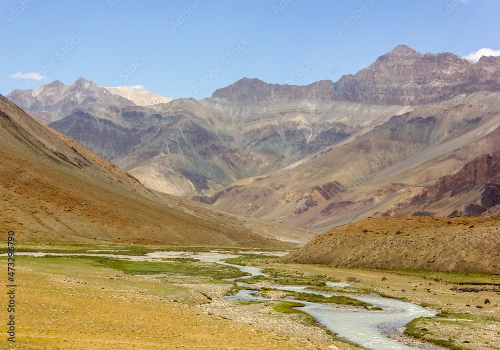 The Zanskar river flows through the high Himalayan mountains on a trekking route in Ladakh in north India.