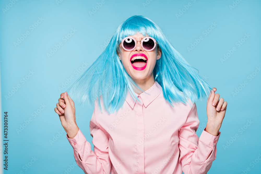 Glamorous woman blue wig makeup fashion posing Glamorous woman blue wig makeup fashion posing