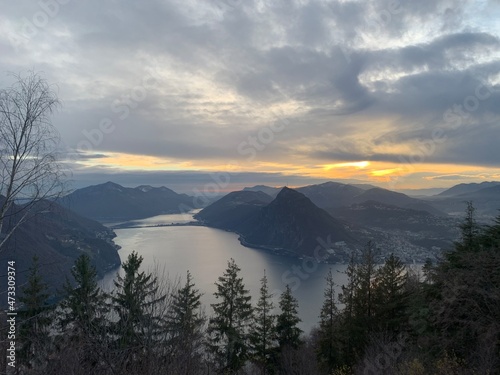 sunset over the city of lugano in switzerland as taken from mont bre