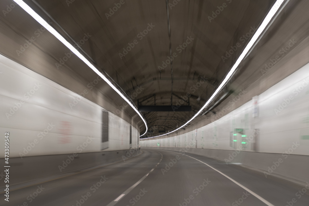 gray road tunnel. city underground bridge. grey tunnel corridor. motion car