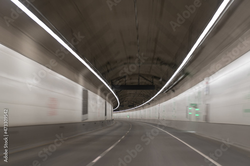 gray road tunnel. city underground bridge. grey tunnel corridor. motion car