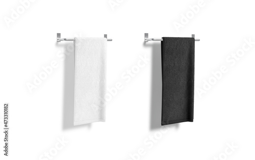 Blank black and white towel on heated rail mockup, isolated