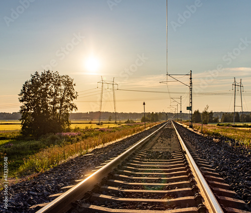 railroad tracks in the evening
