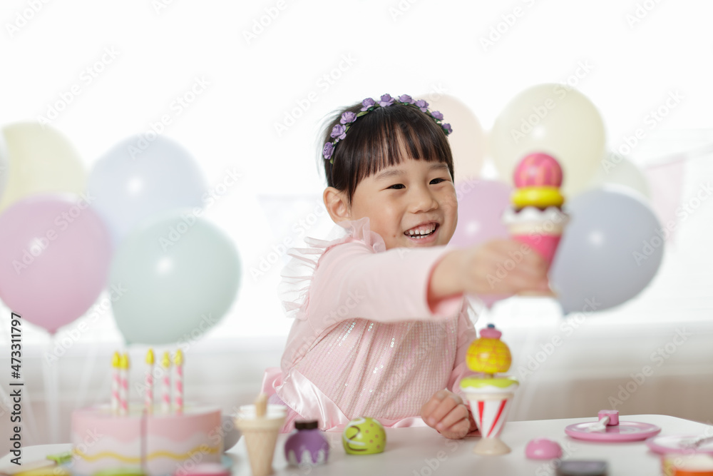 young girl pretend playing food preparing at home young girl pretend playing food preparing at home