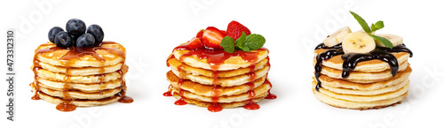 Pancakes with fruit and syrup