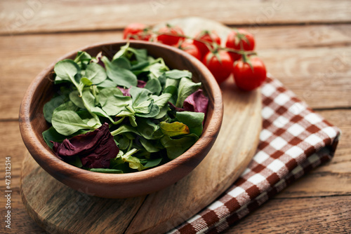 salad plate vegetables fresh ingredients wooden table kitchen